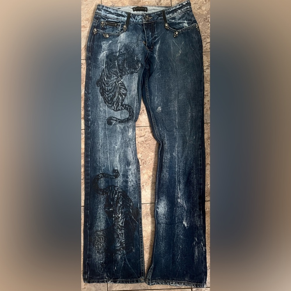 Philipp Plein Jeans with Skulls & Tigers. Skull button, skull back pockets.